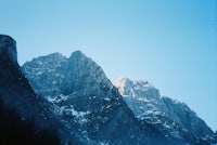 the mountains are covered in snow