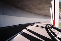 a road under a bridge