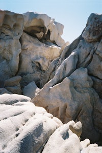 a rock formation with a blue sky