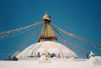 a white building with a dome on top