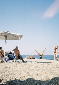a group of people on a beach