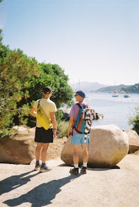 two people standing next to each other