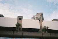 a white building with a blue sky