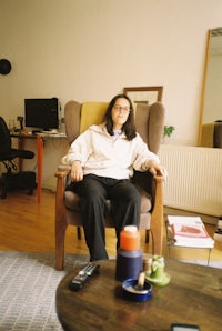 a woman sitting in a chair
