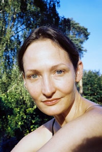 a woman wearing a black tank top